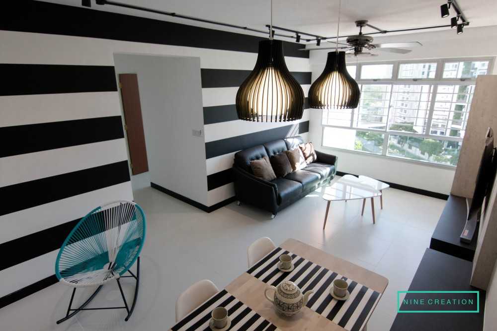 Modern Living Room with Feature Wall and Ottoman