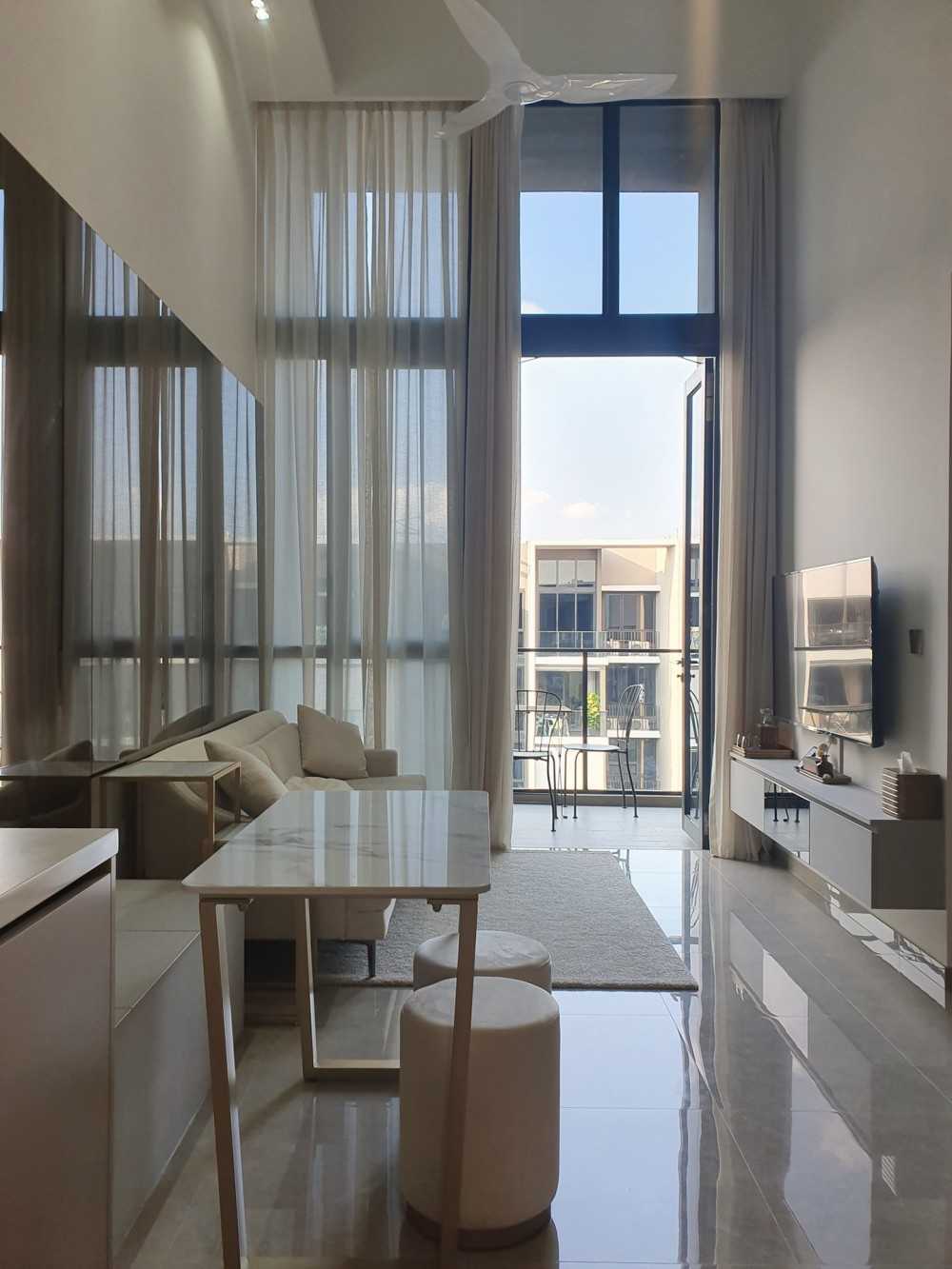 Contemporary Living Room with Homogeneous Tiles and Cove Lighting