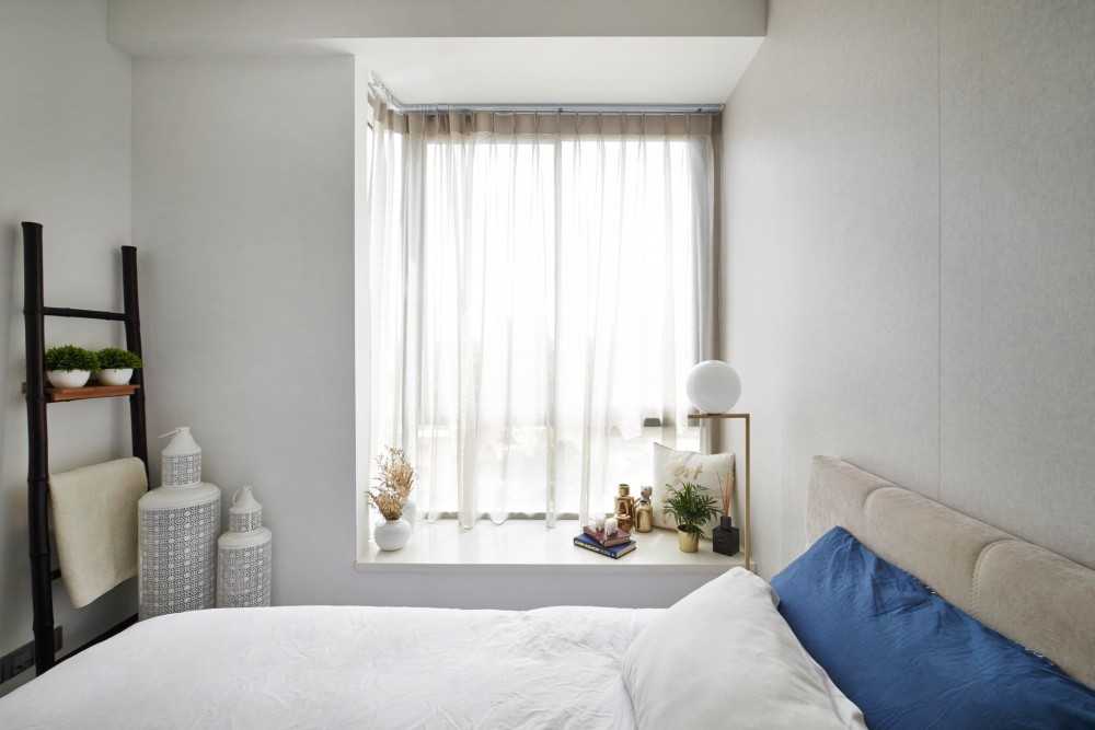 Contemporary Bedroom with Marble Floor and Bay Window