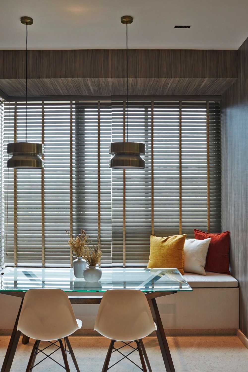 Contemporary Dining Room with Drop Light and Dining Table
