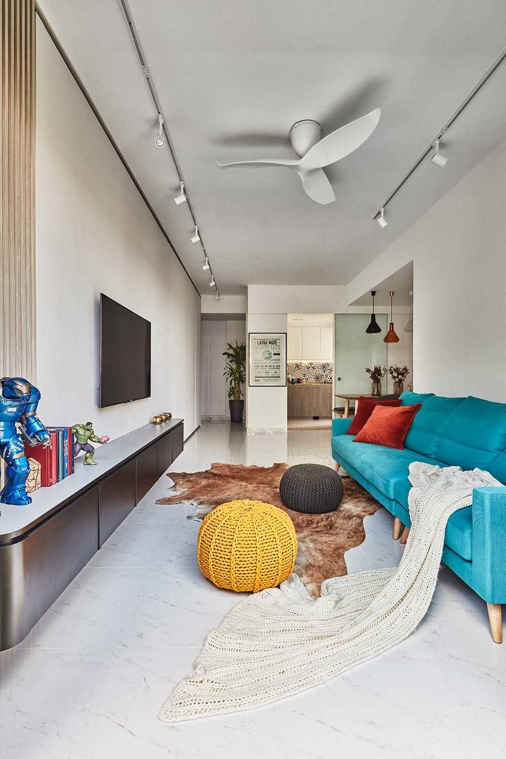 Contemporary Living Room with Homogeneous Tiles and TV Console