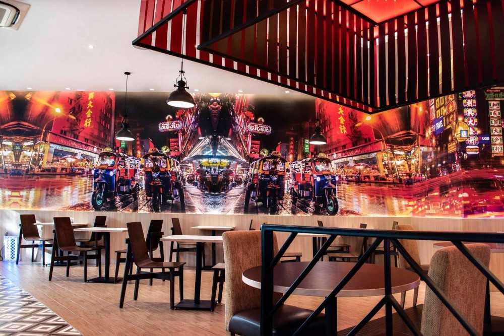 Contemporary Restaurant with Feature Wall and Ceiling Light