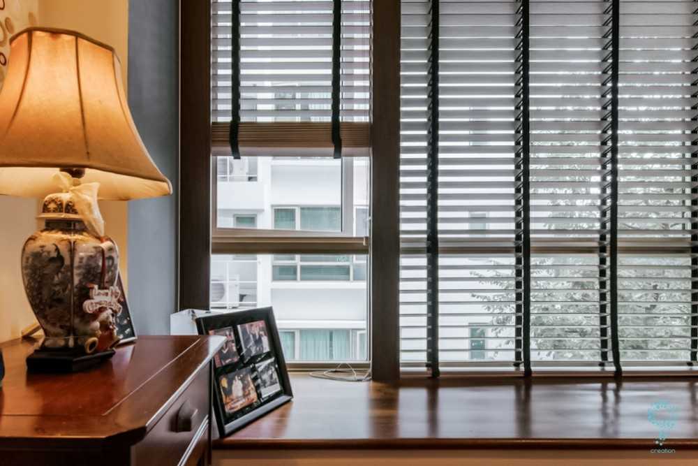 Country Study with Window Seat and Storage Cabinets