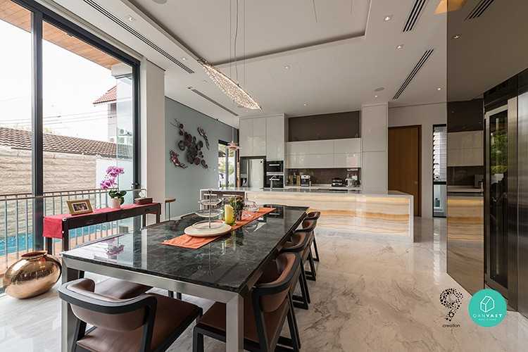 Eclectic Dining Room with Cove Lighting and Drop Ceiling