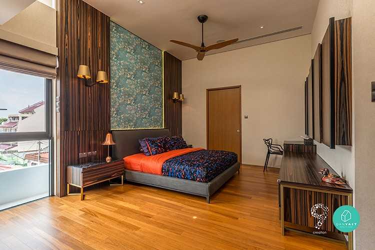 Eclectic Bedroom with Parquet Floor and Feature Wall