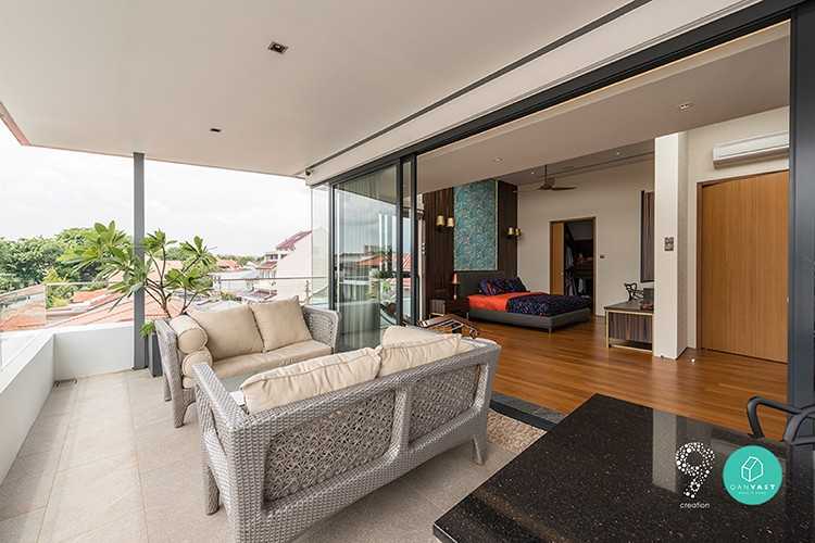 Eclectic Balcony with Parquet Floor and Feature Wall