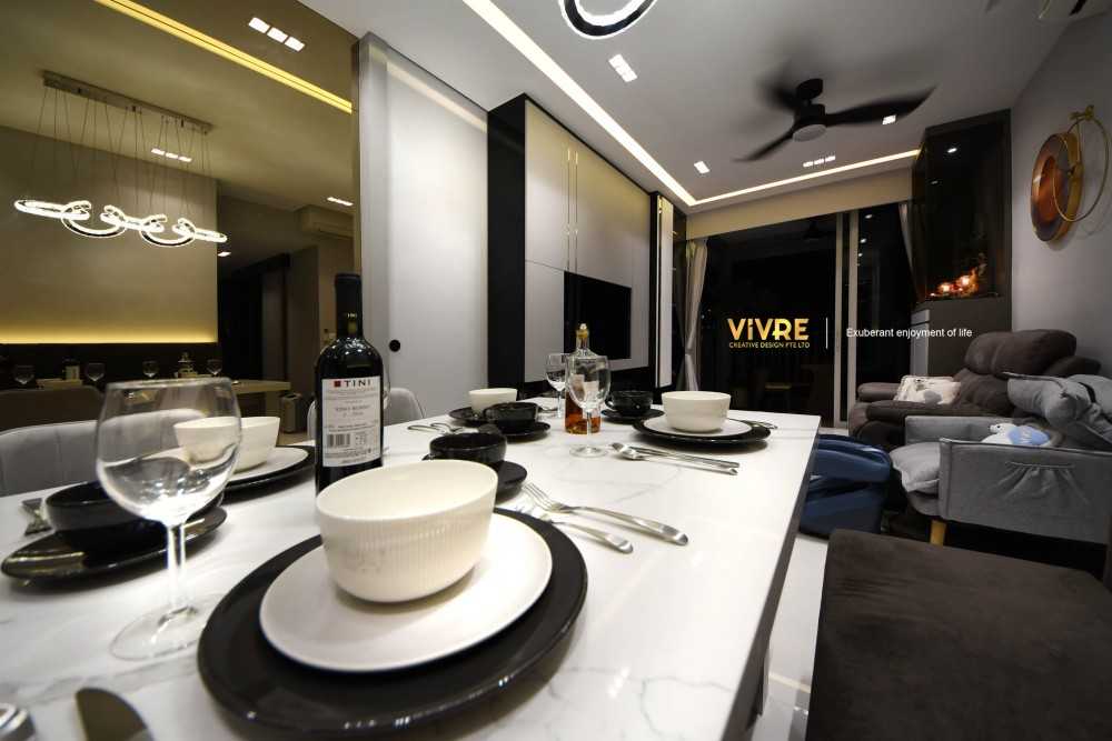 Modern Dining Room with Drop Light and Chandelier