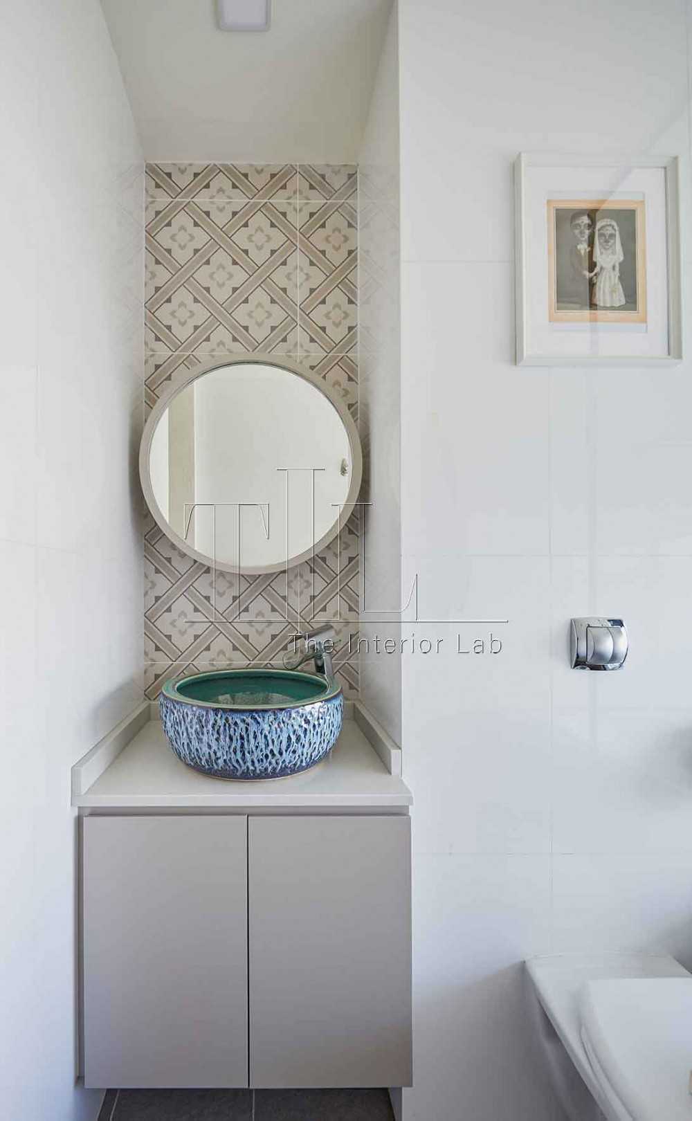 Contemporary Bathroom with Mirror and Paintings