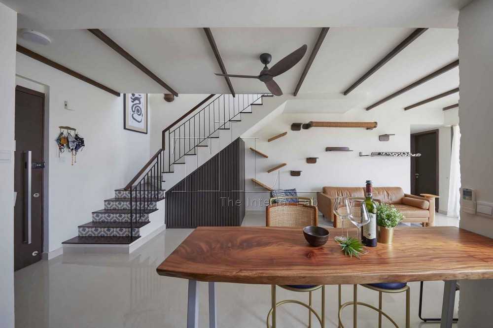 Contemporary Dining Room with Kitchen Island and Staircase