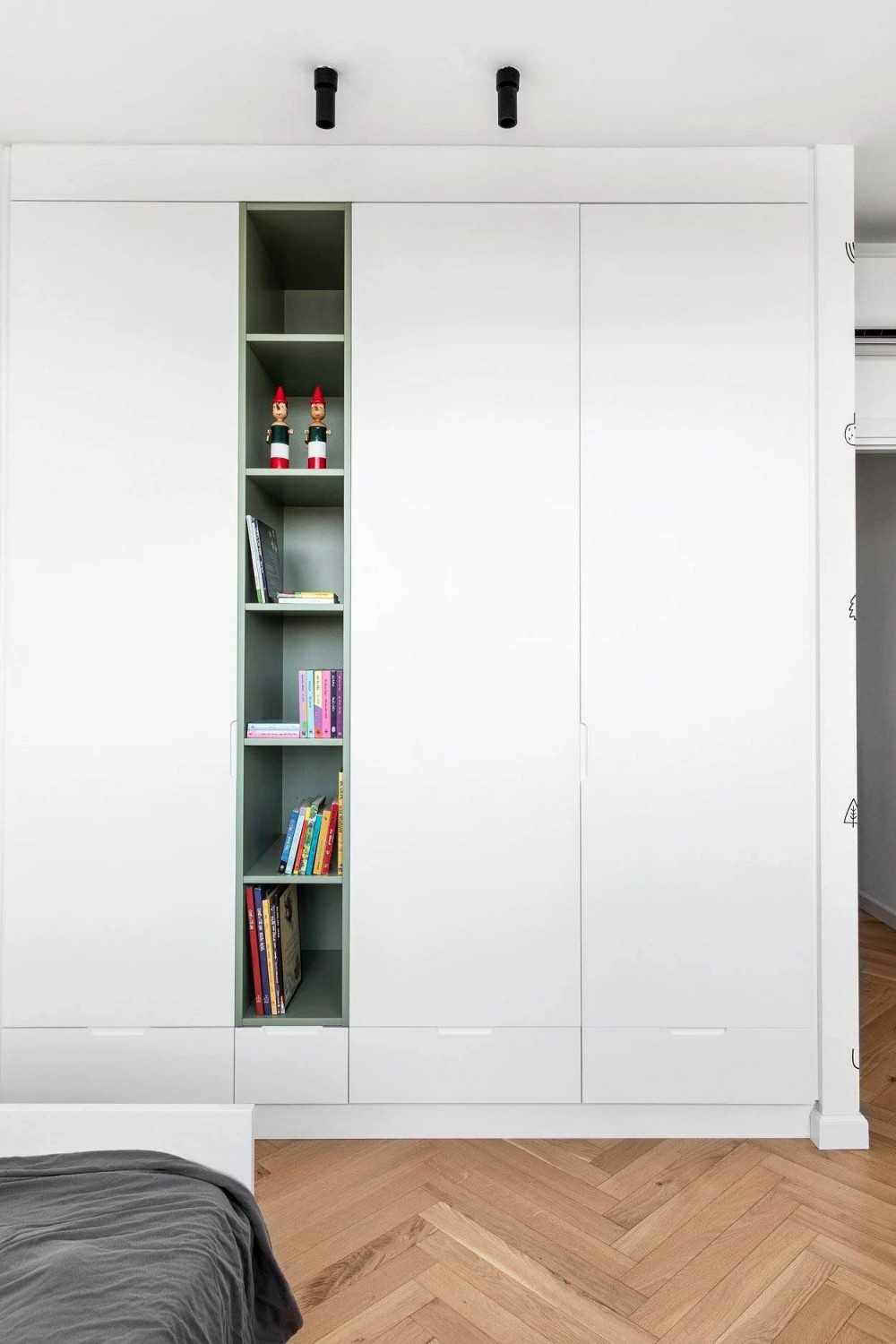 Contemporary Bedroom with Bookshelf and Herringbone Tiling