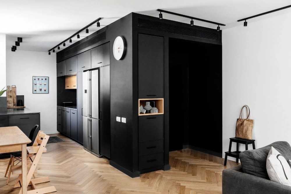 Contemporary Kitchen with Herringbone Tiling and Breakfast Counter