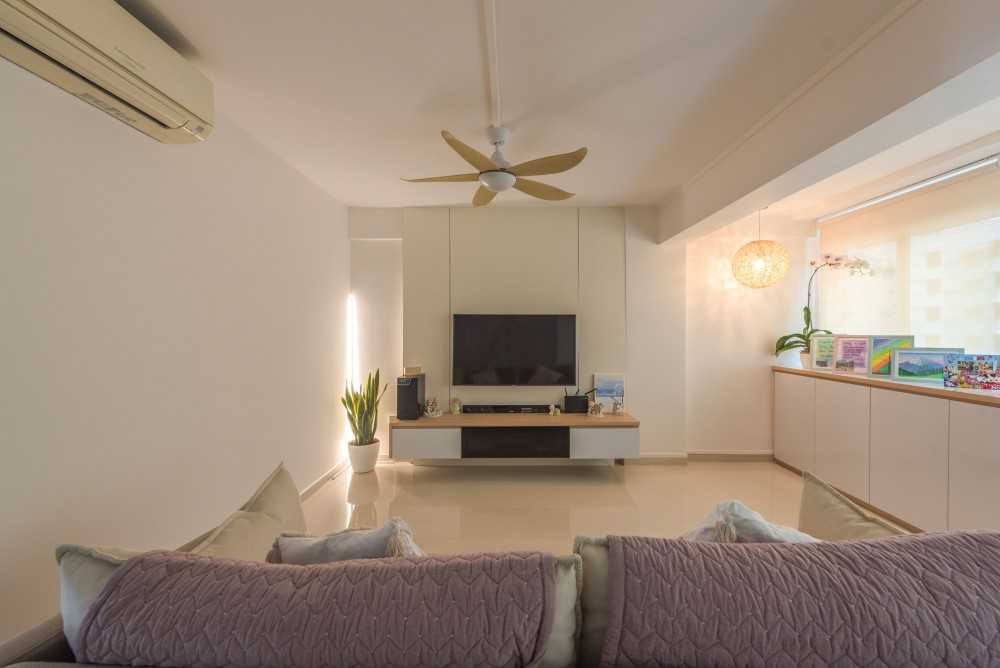 Scandinavian Living Room with Homogeneous Tiles and TV Console