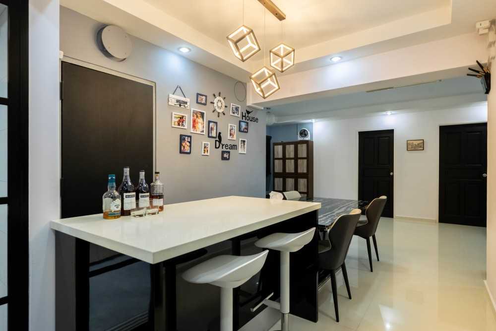 Contemporary Dining Room with Drop Light and Dining Table