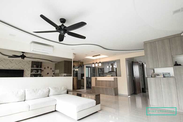 Modern Living Room with Bookshelf and Settee