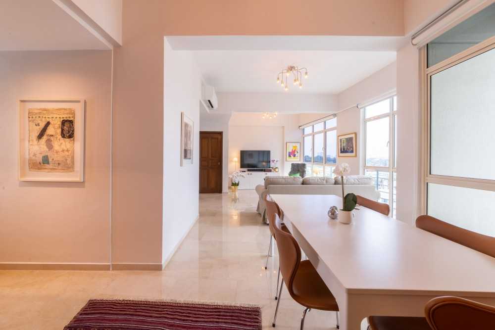 Contemporary Dining Room with Chandelier and Downlights