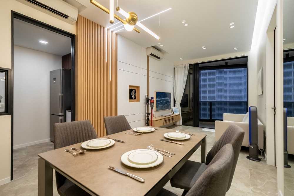 Scandinavian Dining Room with Cove Lighting and Dining Table