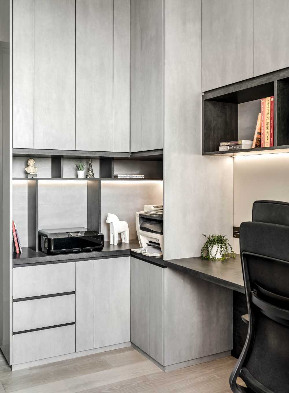 Minimalist Home Office with Bookshelf and Desk Chairs
