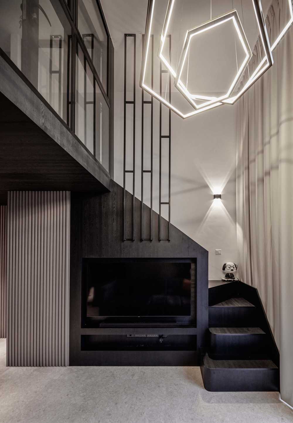 Contemporary Living Room with Feature Wall and Drop Light