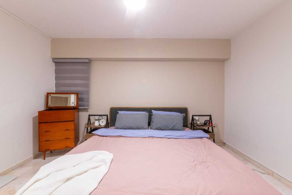 Modern Bedroom with Marble Floor and Bedside Table