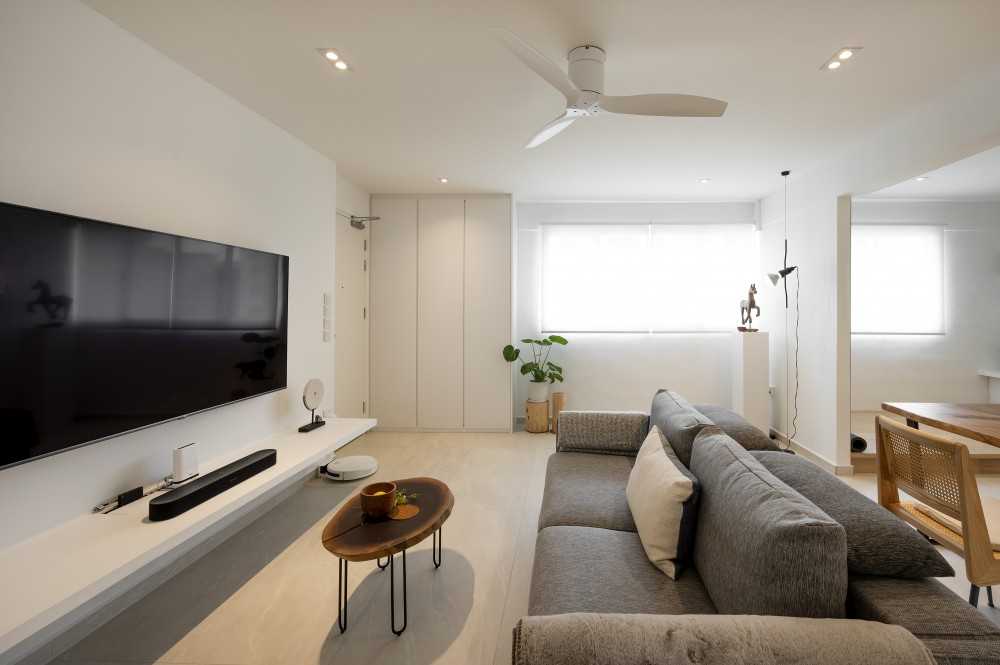 Eclectic Living Room with Homogeneous Tiles and Sofa