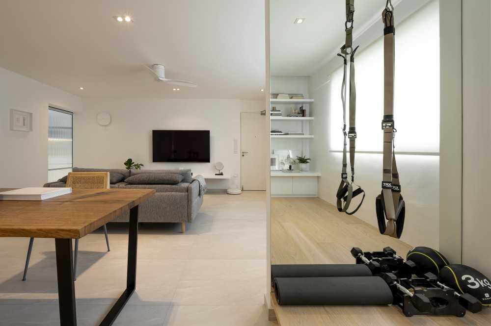 Eclectic Home Gym with Mirror and Sofa
