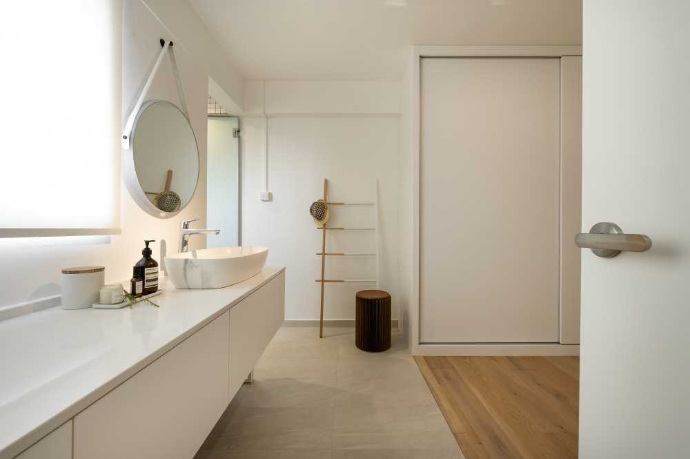 Eclectic Walk-in Wardrobe with Wood Flooring and Mirror