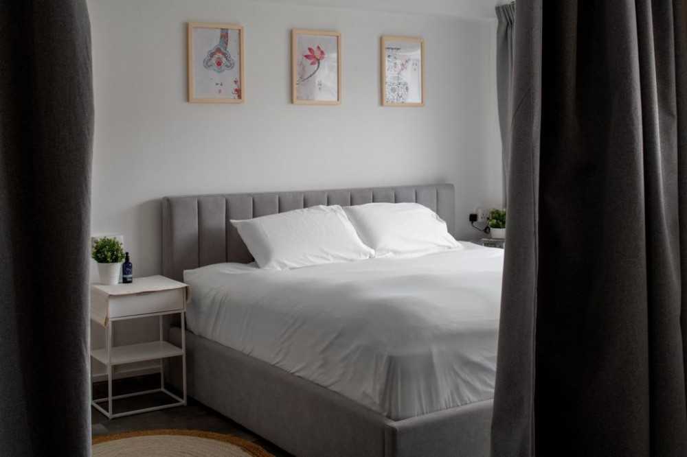 Minimalist Bedroom with Wardrobe and Built-in Bed