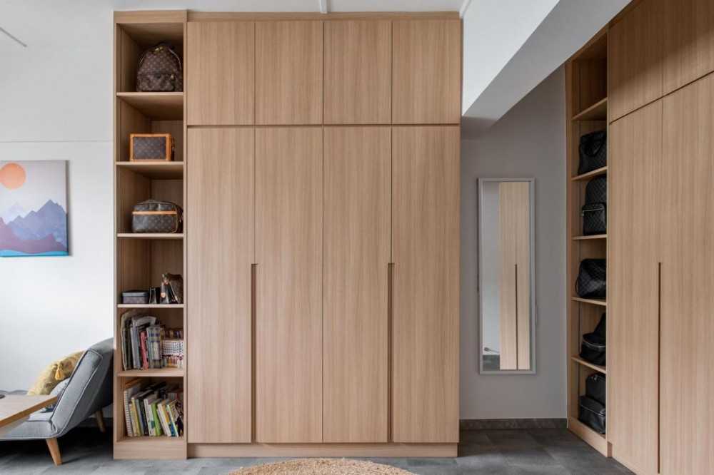 Minimalist Bedroom with Wood Flooring and Wardrobe