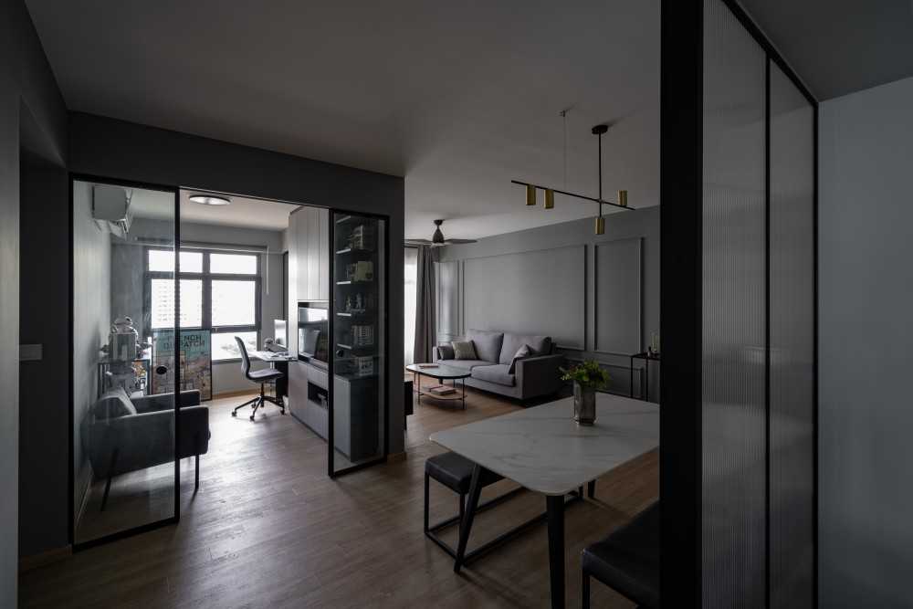 Contemporary Living Room with Bookshelf and Ceiling Light