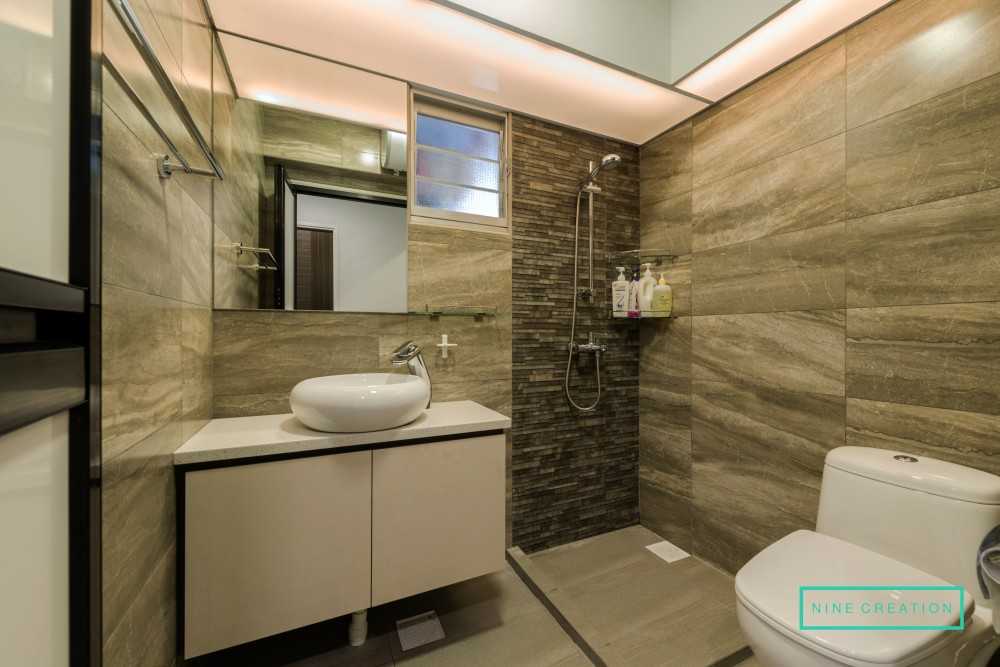 Modern Bathroom with Homogeneous Tiles and Vanity Counter