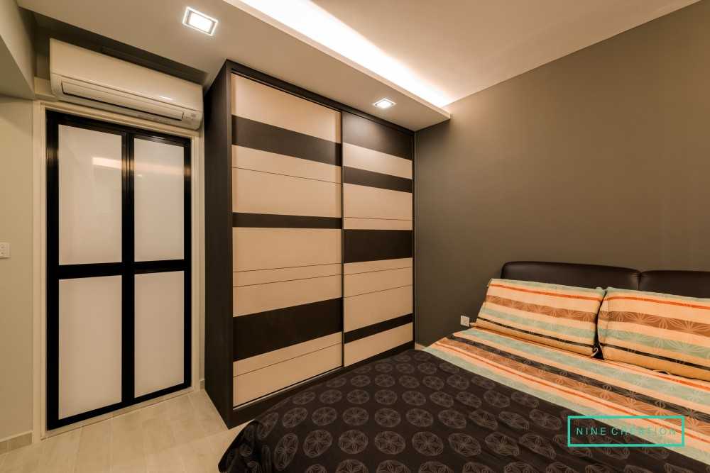 Modern Bedroom with Cove Lighting and Wardrobe