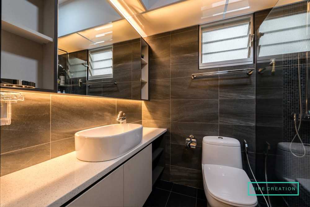 Modern Bathroom with Mirror and Cove Lighting