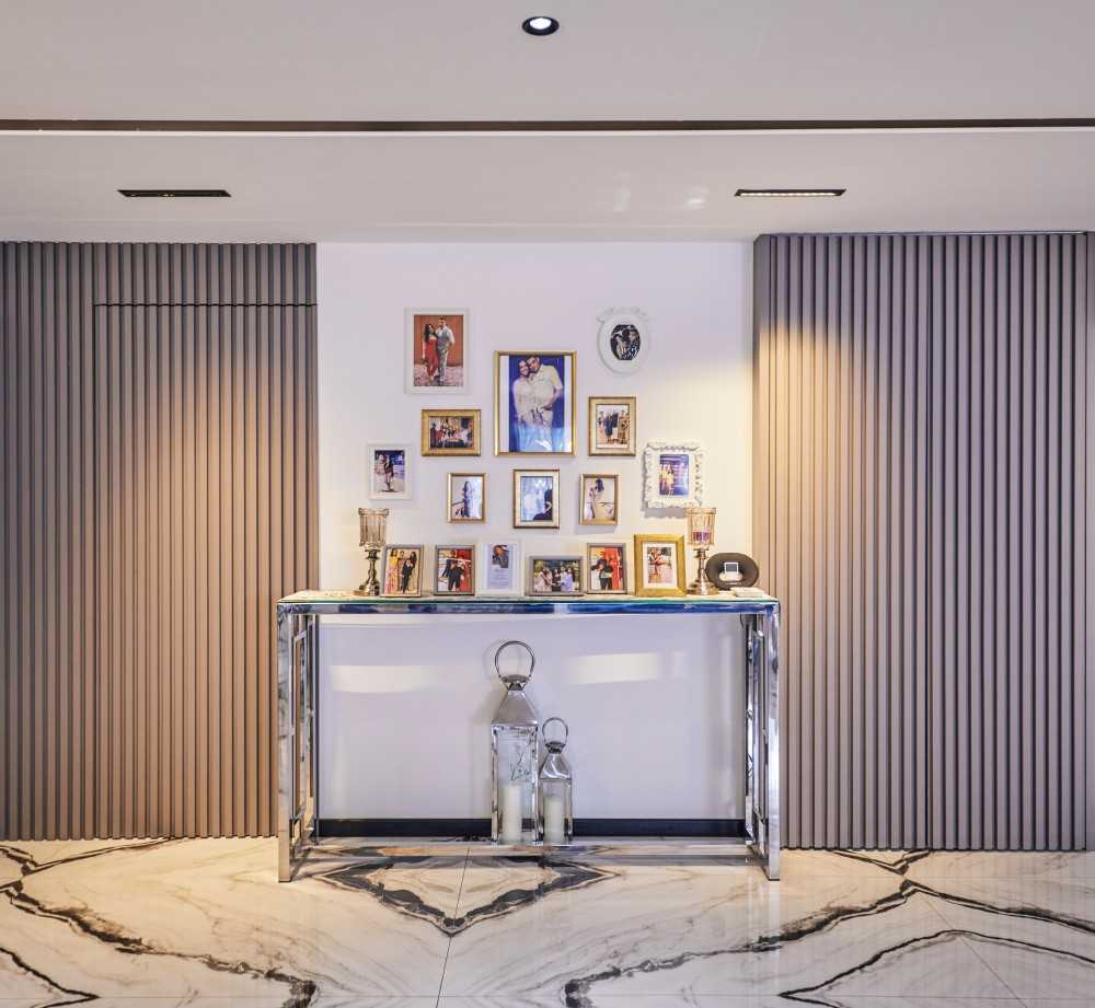 Contemporary Living Room with Marble Floor and Feature Wall