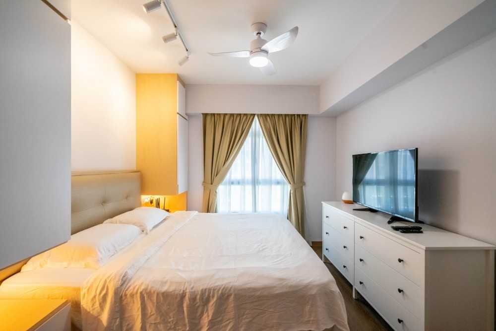 Modern Bedroom with Wood Flooring and Ceiling Light