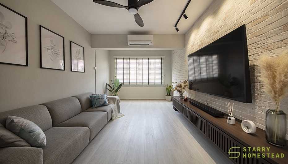 Country Living Room with Wood Flooring and Feature Wall