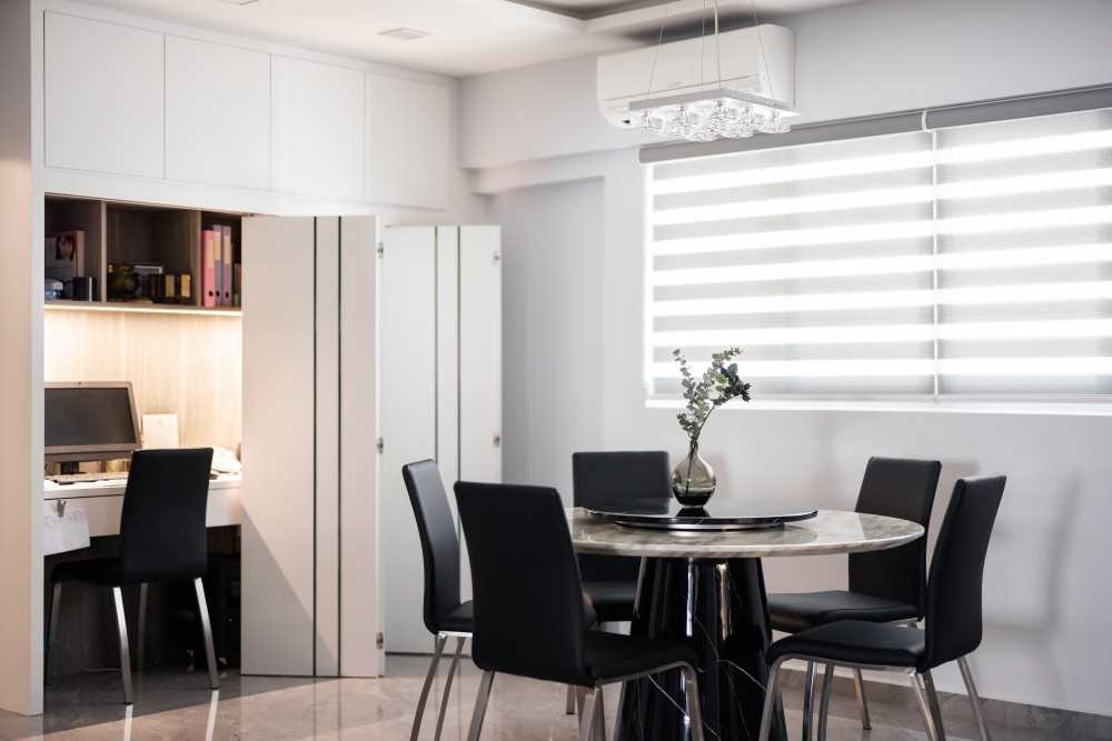 Contemporary Dining Room with Chandelier and Dining Table