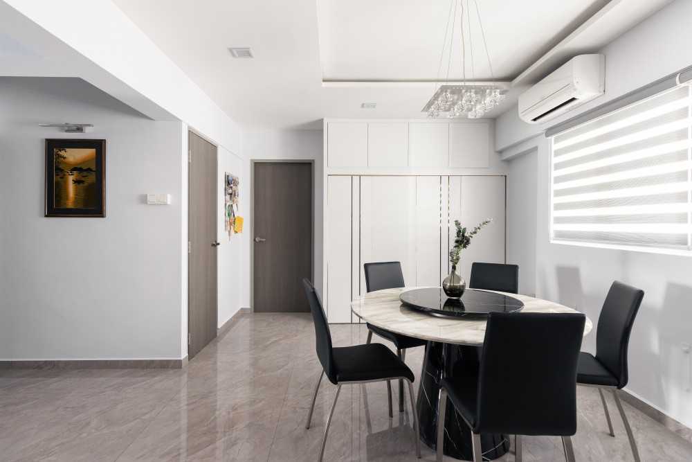 Contemporary Dining Room with Marble Floor and Cove Lighting