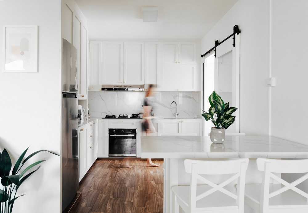 Scandinavian Kitchen with Countertop and Vinyl Flooring