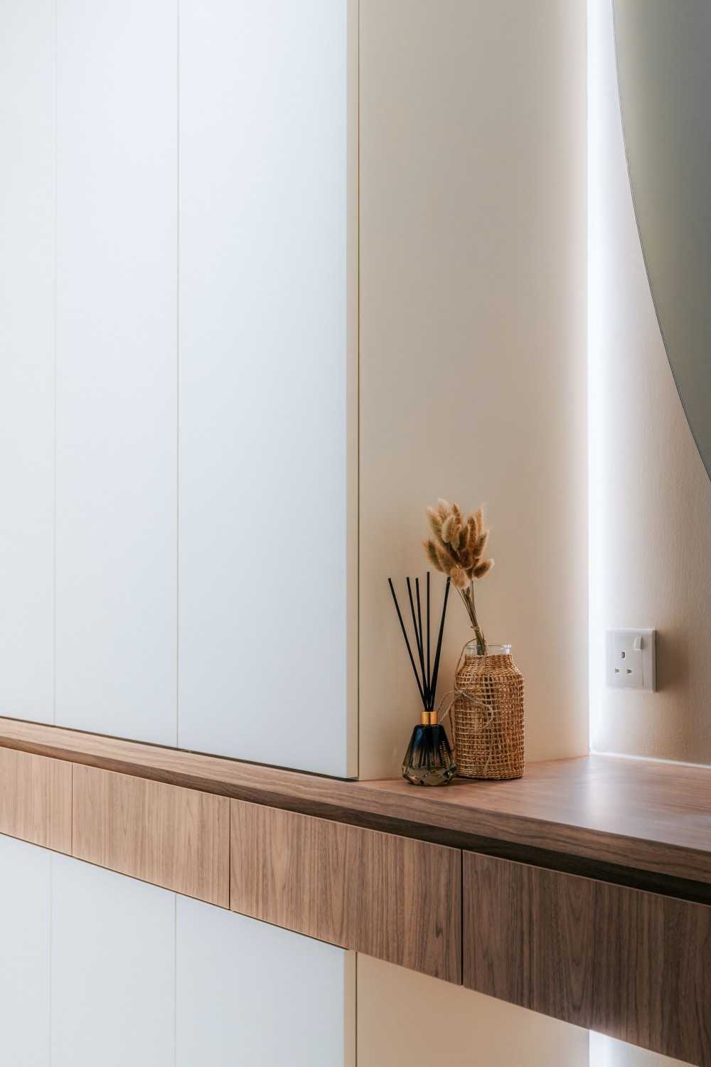 Scandinavian Living Room with Storage Cabinets and Lighting