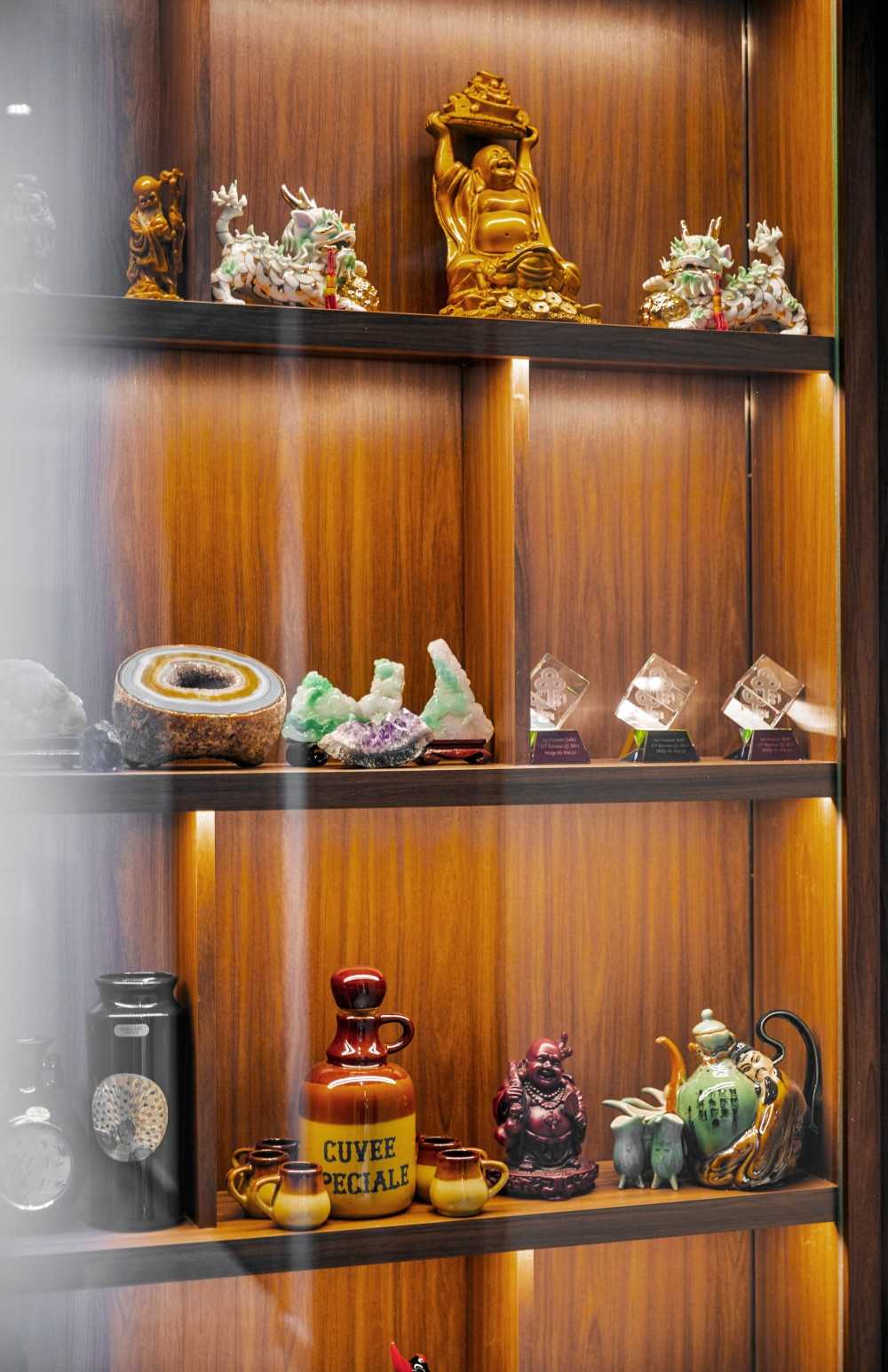 Contemporary Living Room with Feature Wall and Display Cabinets
