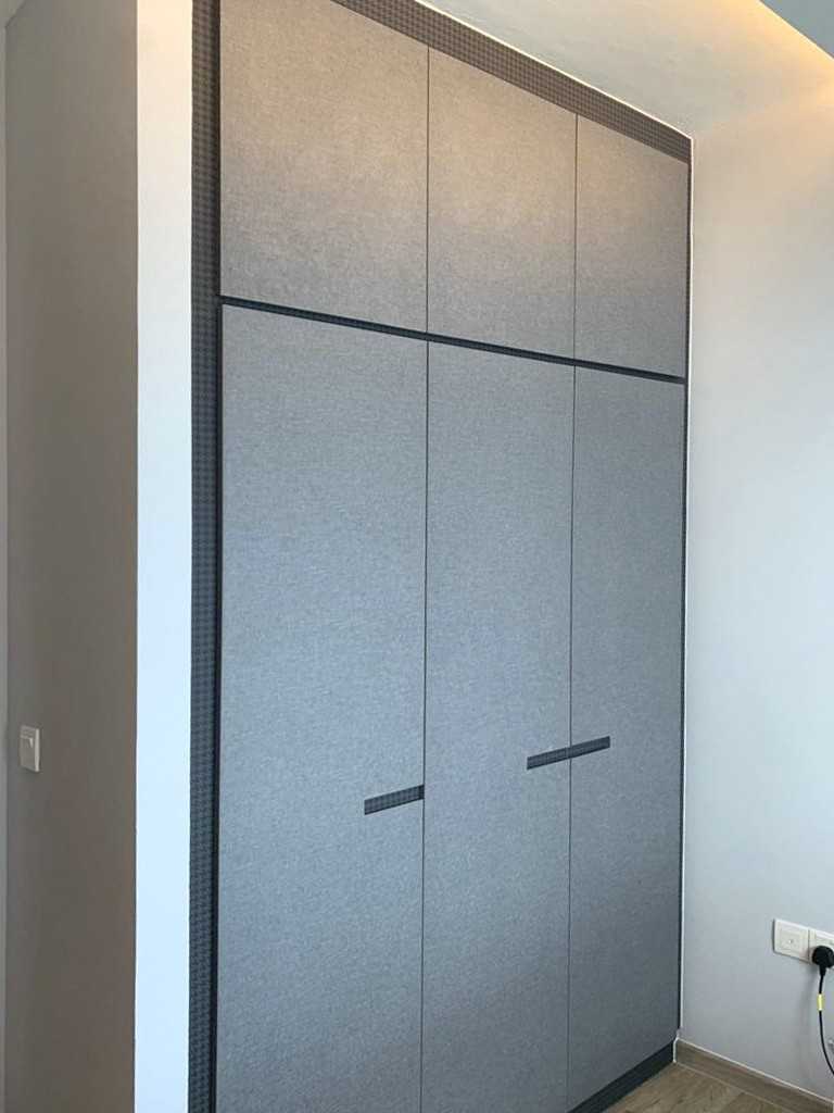 Modern Bedroom with Wardrobe and Paintings