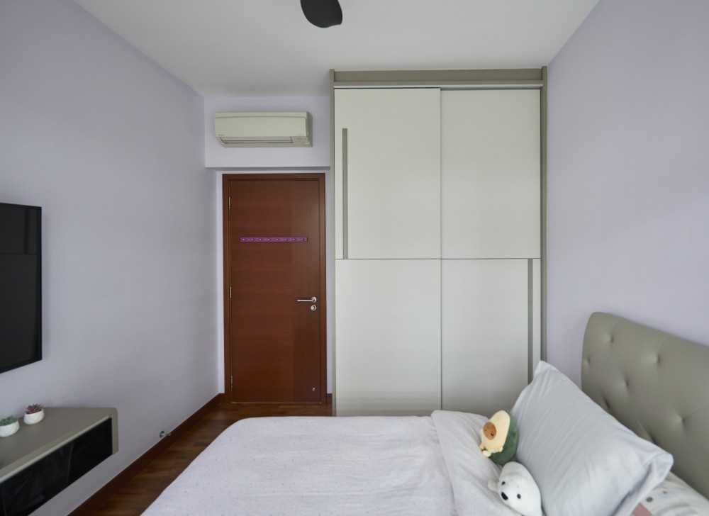 Scandinavian Bedroom with Paintings and Storage Cabinets