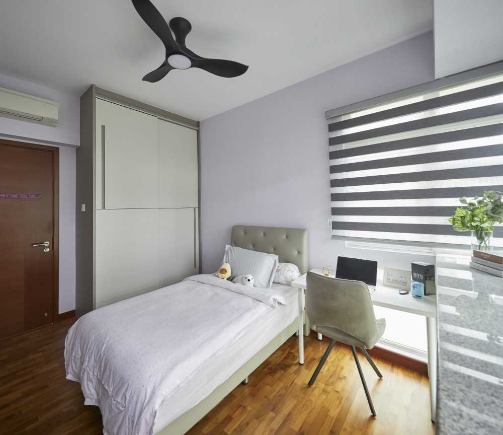 Scandinavian Bedroom with Wood Flooring and Paintings