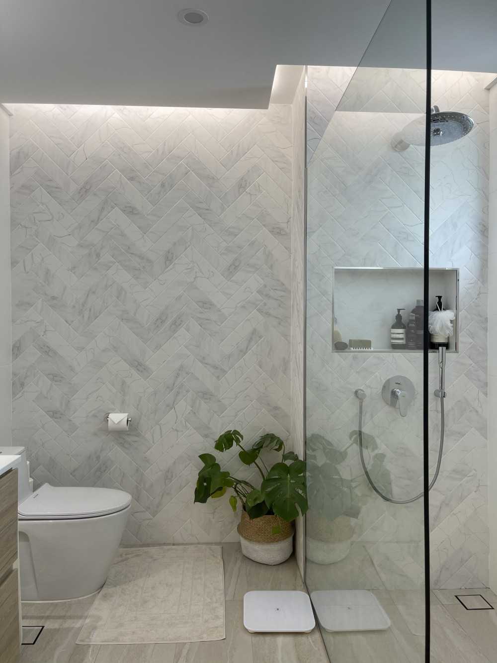 Scandinavian Bathroom with Feature Wall and Bathroom Accessories
