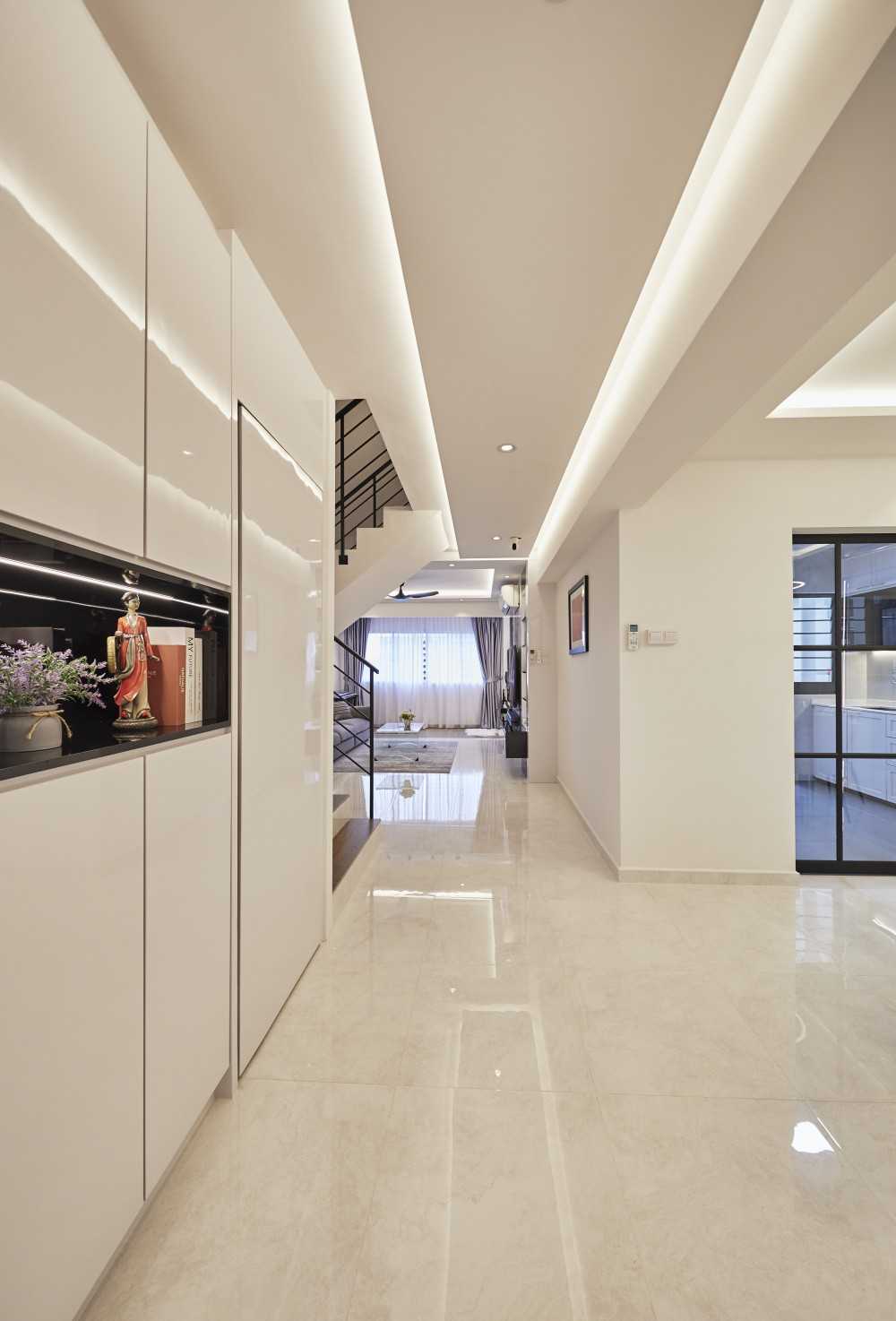 Modern Entryway with Wardrobe and Paintings