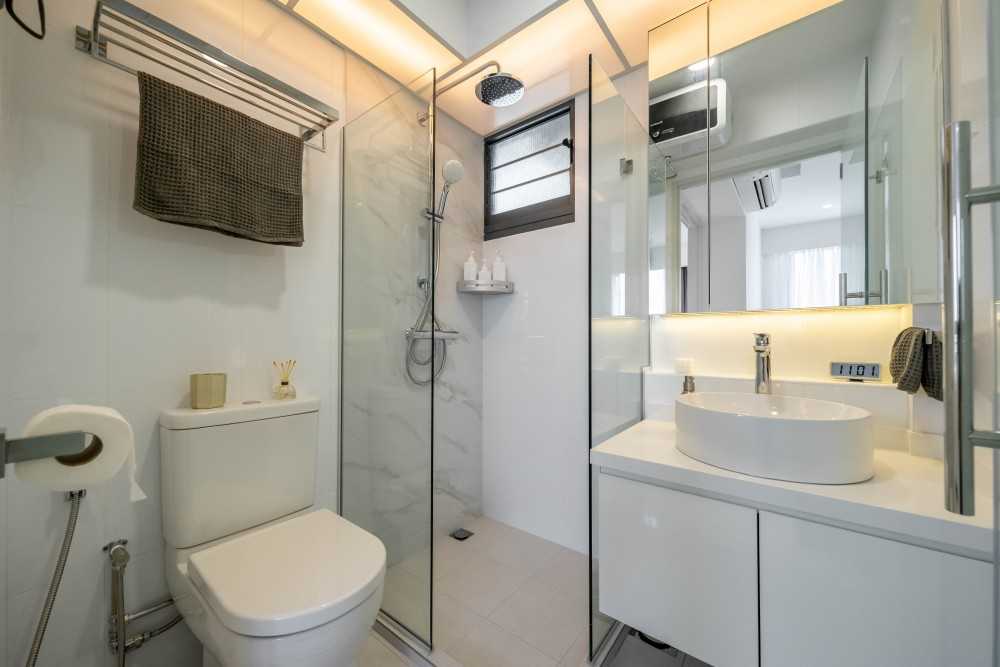 Minimalist Bathroom with Wood Flooring and Mirror