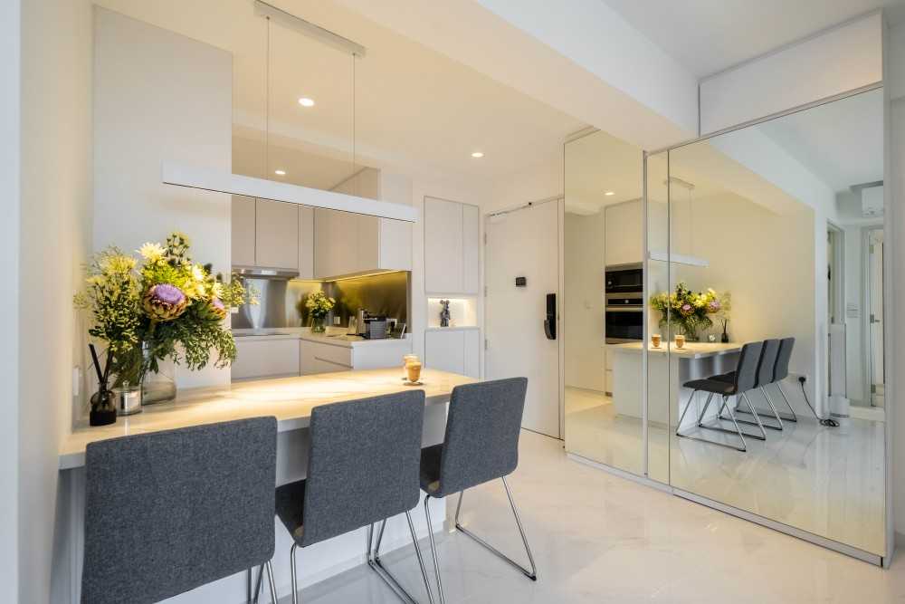 Minimalist Kitchen with Cement Floor and Wood Flooring