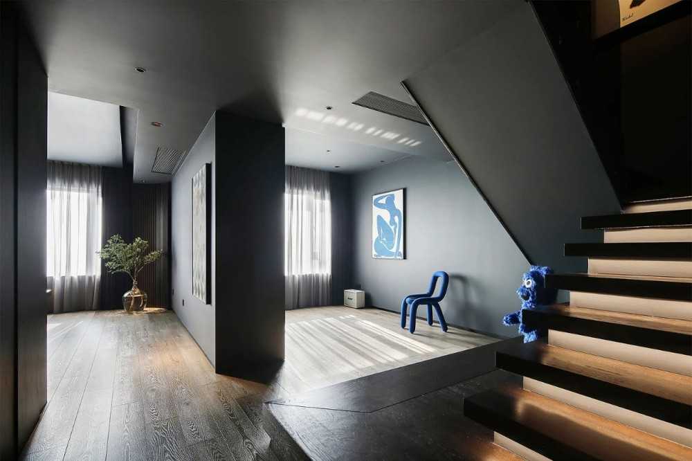 Contemporary Entryway with Parquet Floor and Drop Light