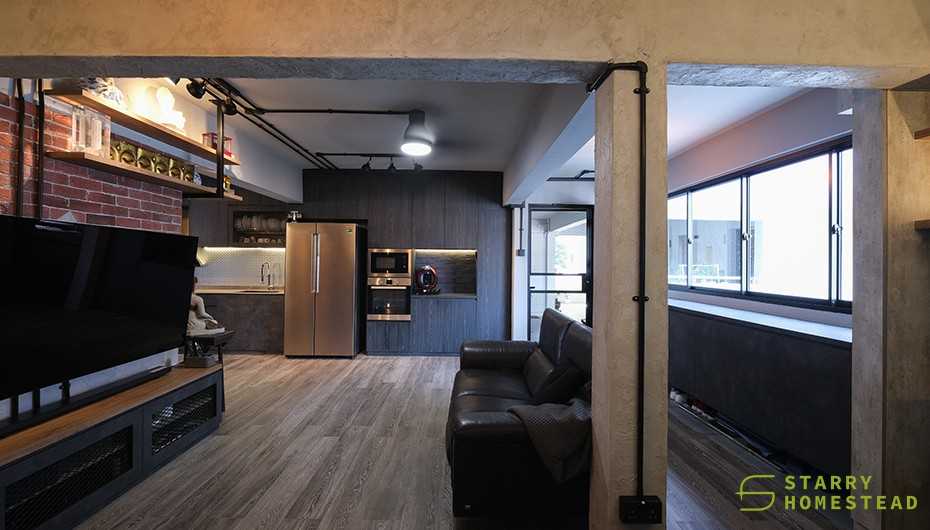 Industrial Living Room with Feature Wall and Paintings