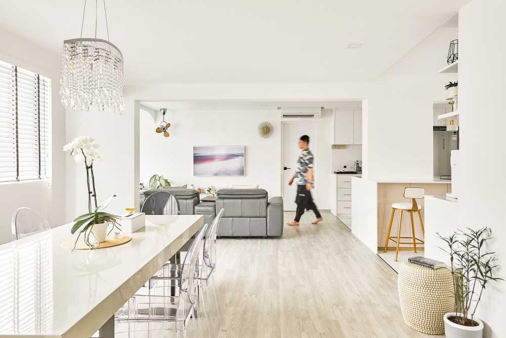 Modern Dining Room with Chandelier and Sofa